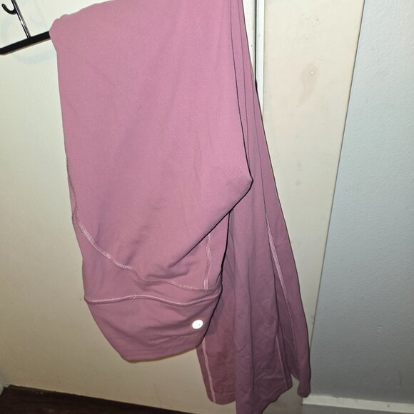 Lululemon Groove Flared Pant in a soft pink. - Picture 1 of 3